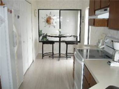 Holmes Beach Vacation Rental with Bay View Sleeps Five